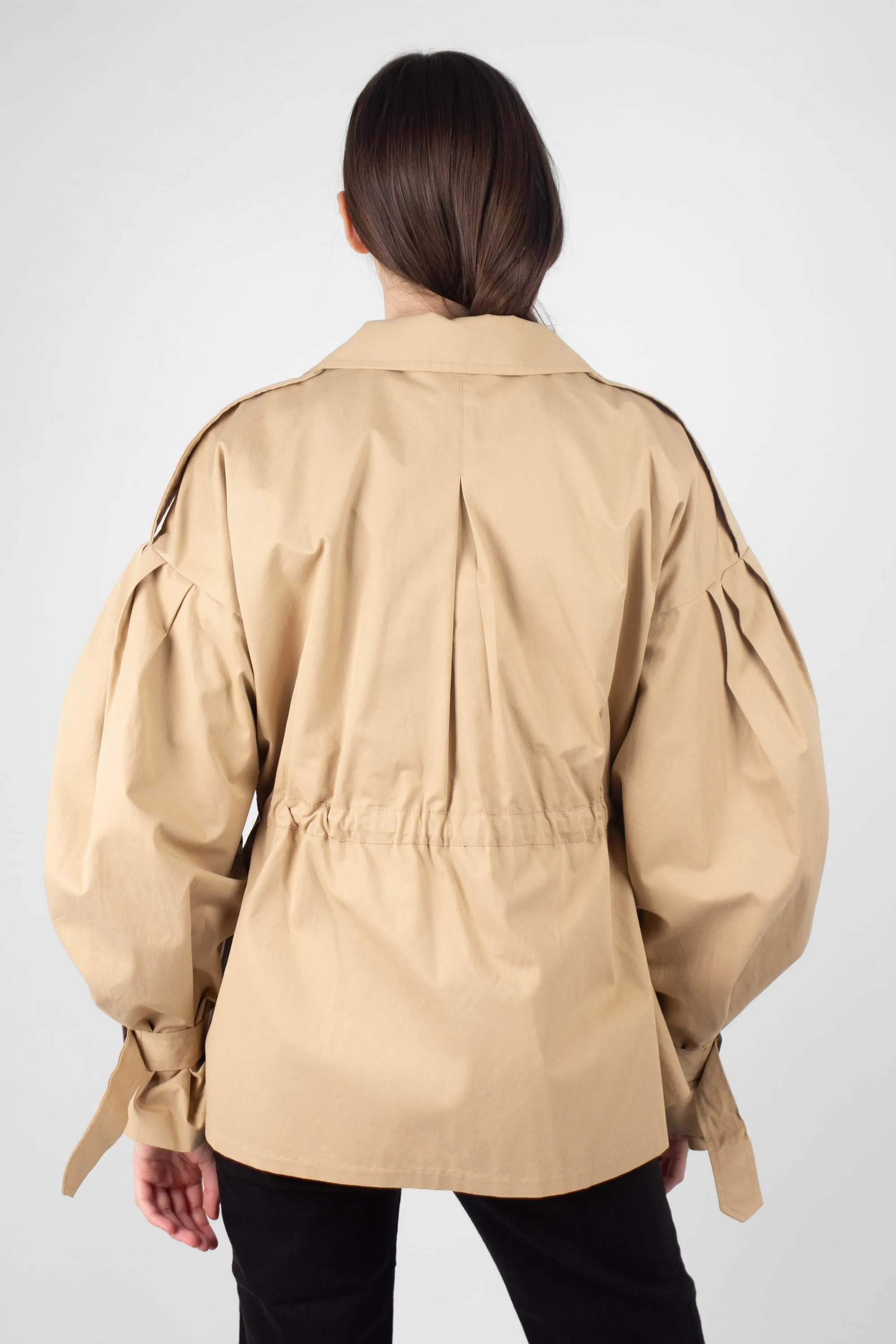 Beige double breasted half length trench coat