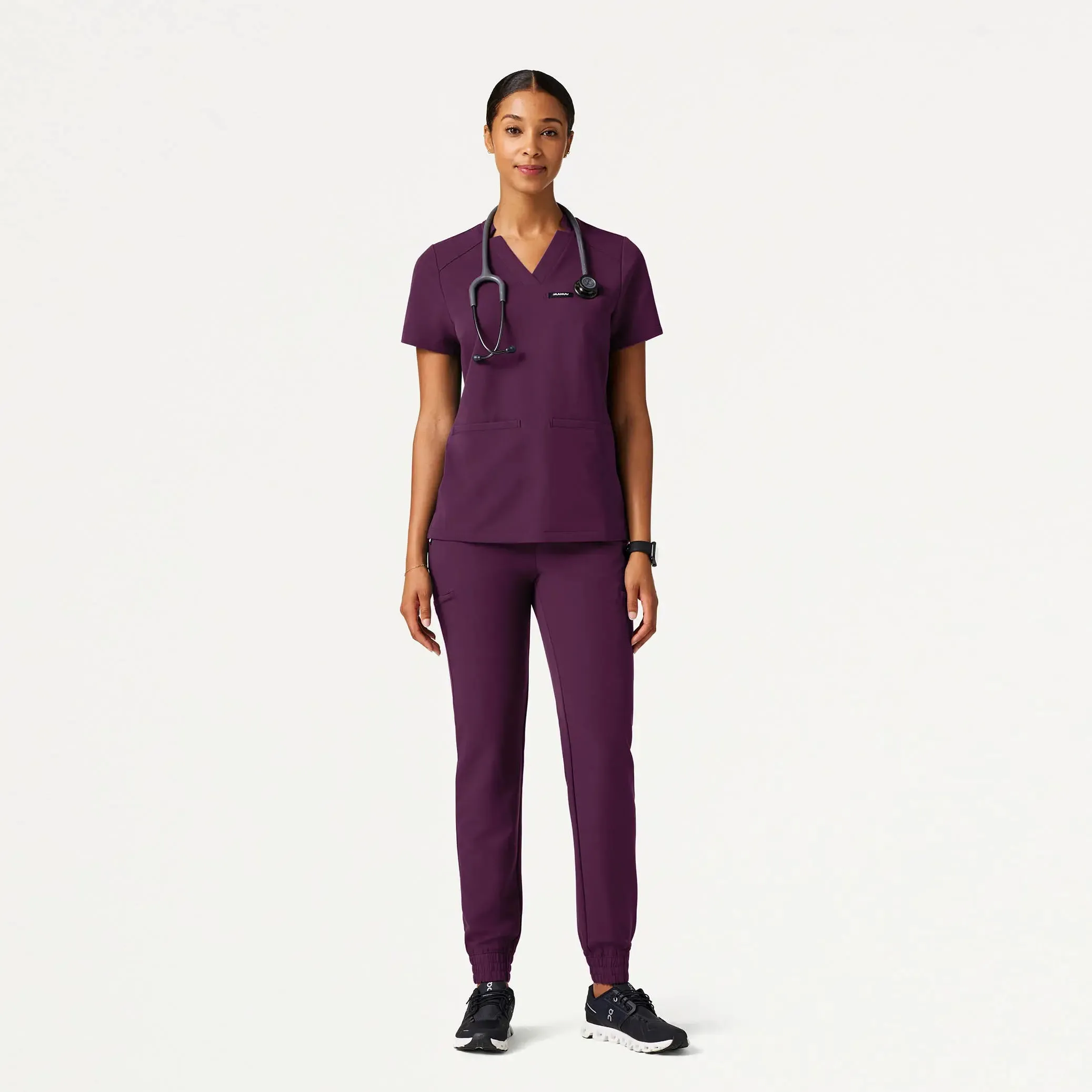 Jaanuu Women's Helia Slim Notched V-Neck Scrub Top - Dark Amethyst